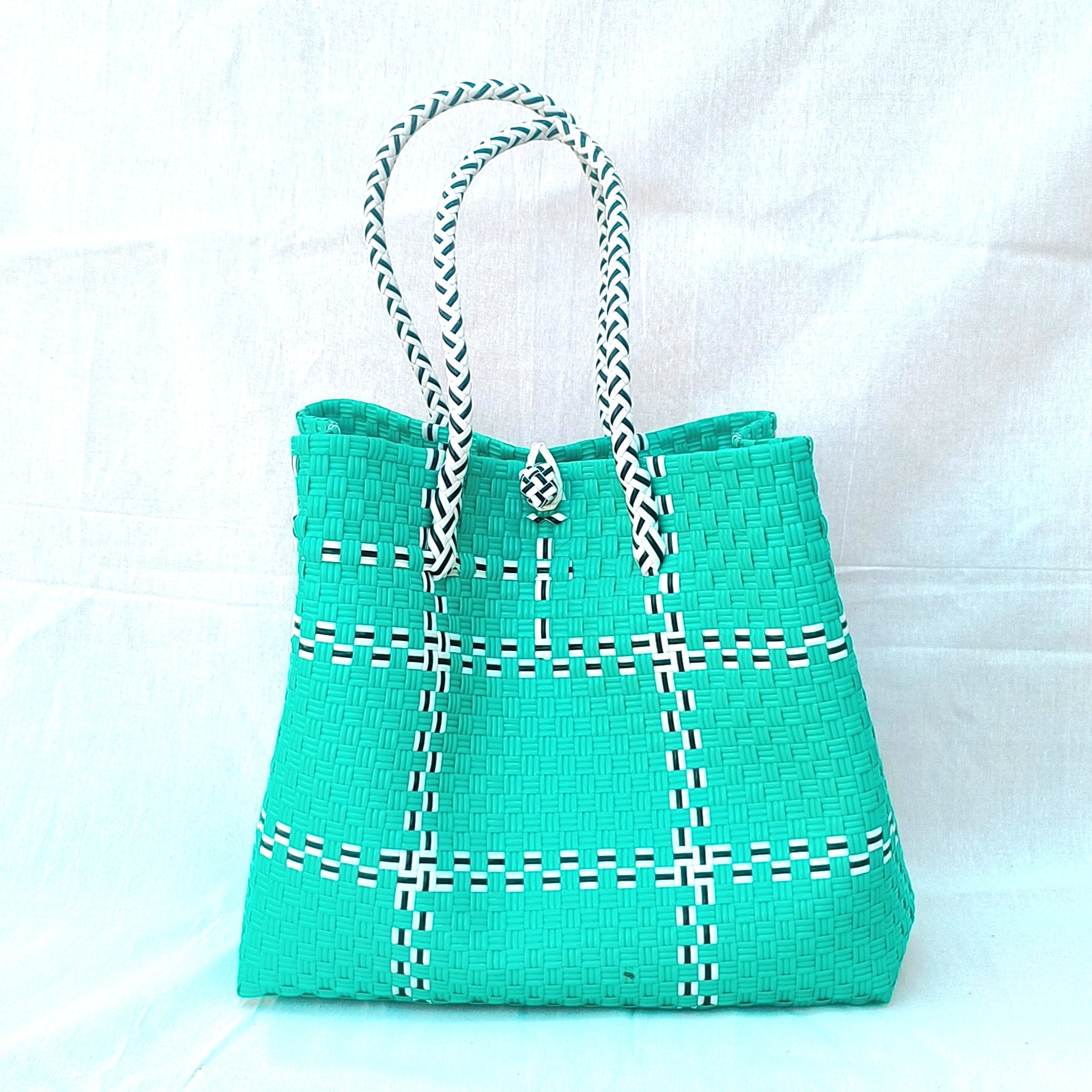 Tic Tak Teal - Sleek, fashion-focused, and tied to oceanfront elegance from Oceania collection
