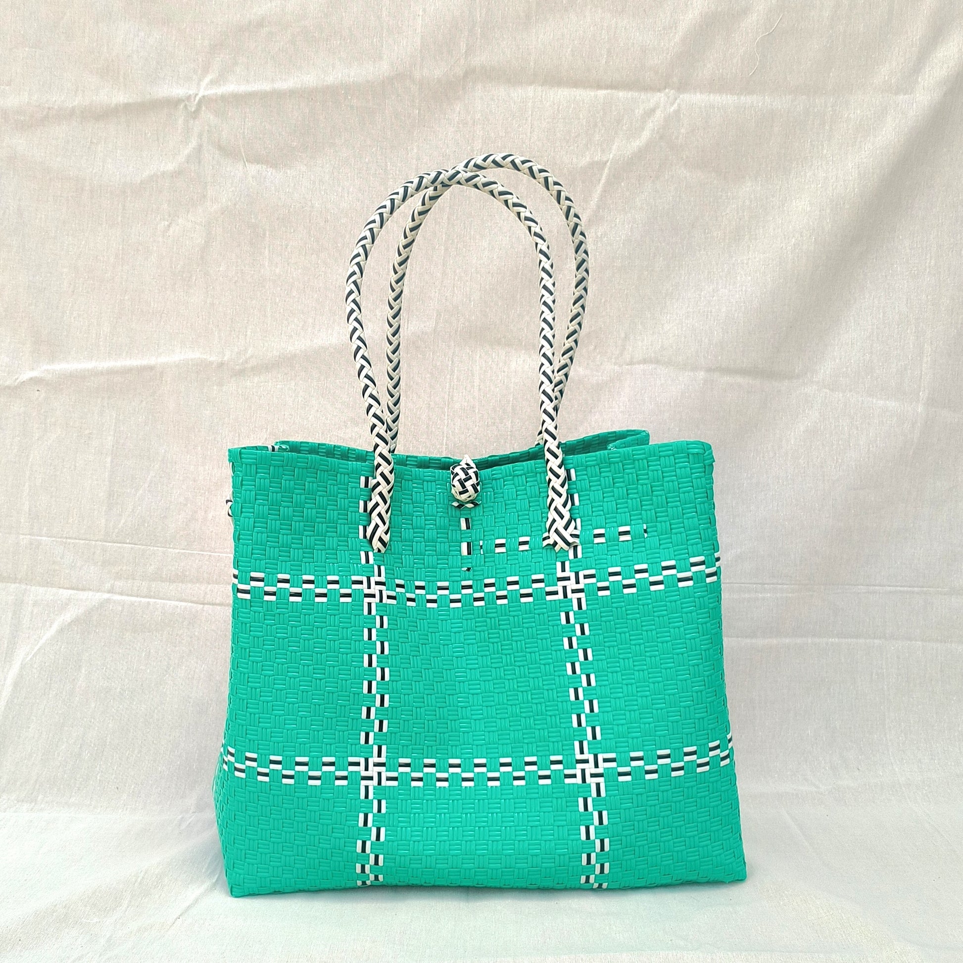 Tic Tak Teal - Sleek, fashion-focused, and tied to oceanfront elegance from Oceania collection