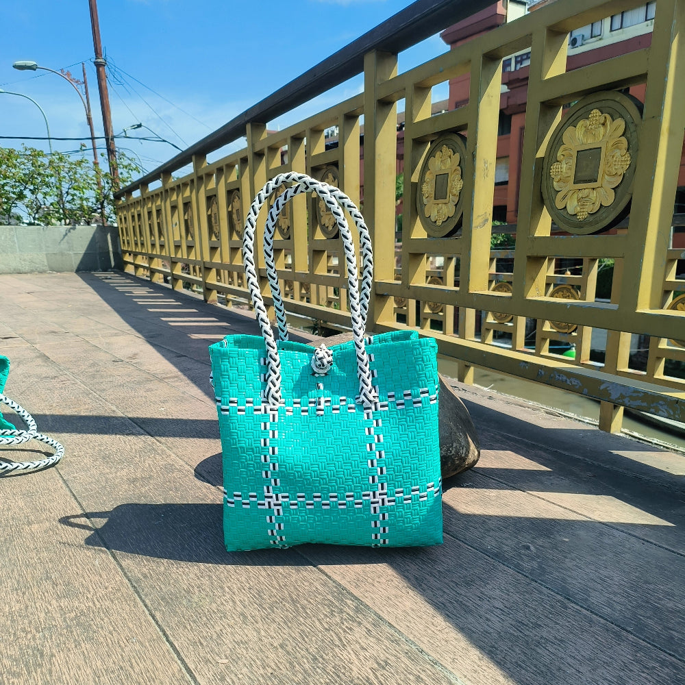 Tic Tak Teal - Sleek, fashion-focused, and tied to oceanfront elegance from Oceania collection